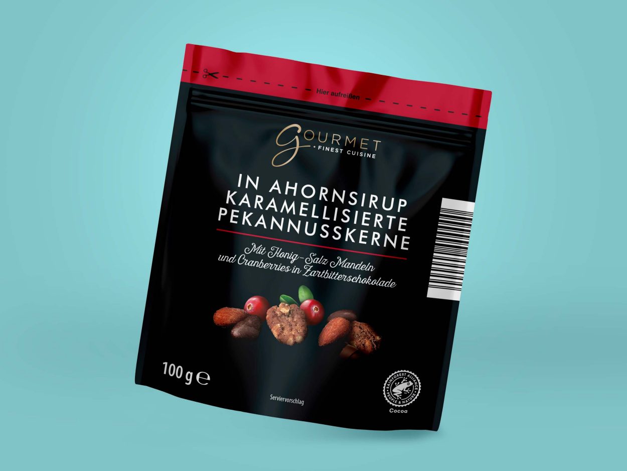 Czekolada mleczna zamiast gorzkiej. Aldi wycofuje ze sprzedaży partię produktu 1 GOURMET FINEST CUISINE, MIESZANKA PRAŻONYCH ORZECHÓW PEKAN, PRAŻONYCH I SOLONYCH MIGDAŁÓW ORAZ SŁODZONEJ, SUSZONEJ ŻURAWINY W CZEKOLADZIE GORZKIEJ