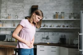 young woman suffering from stomach pain 04c737ee6d6e